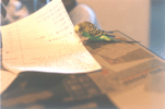A paper punching device. Click to enlarge.
